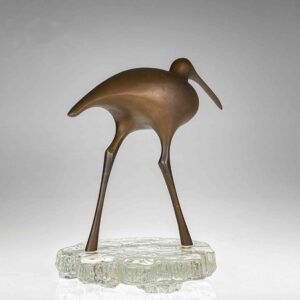 Tapio Wirkkala - A bronze sculpture of a bird "Suokurppa" on a glass stand, model TW513 - Kultakeskus / Iittala, Finland ca. 1975