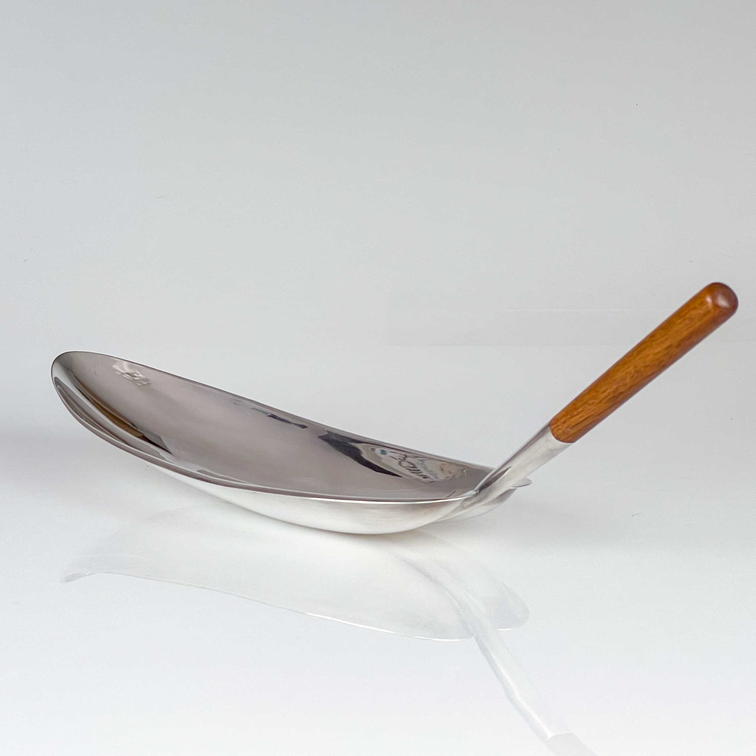 Tapio Wirkkala - A Sterling silver dish with teakwood handle, model TW85, Handmade to Order - Kultakeskus, Finland 1965